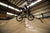 Young BMX Rider jumping the hip during a Progression Session event at RampFest indoor skate park Melbourne.