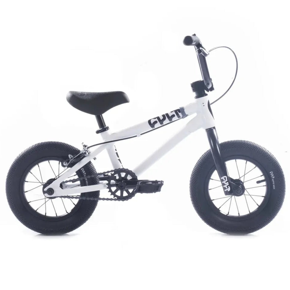 White children's cult bmx bike with black seat on a white background