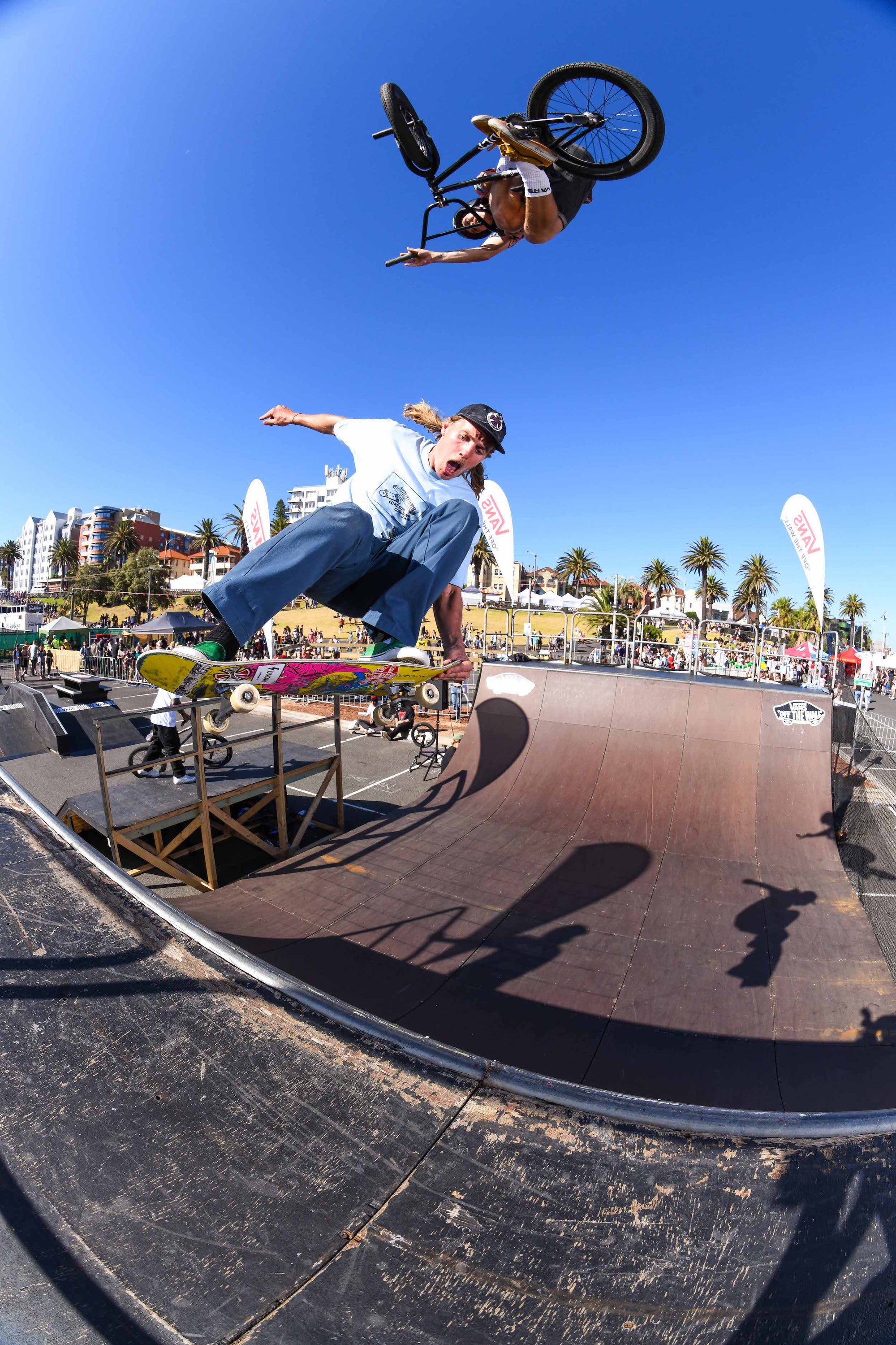 RampFest Pro Rider Jason Watts, and Pro Skater Tommy Breaks perform at a RampFest half-pipe Show in St Kilda Festival, Melbourne.