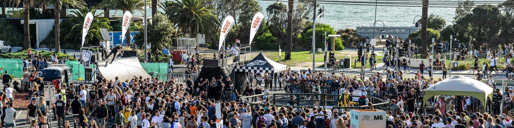 Skateboarding and BMX Demonstration in a Half Pip at St Kilda Festival, Melbourne.