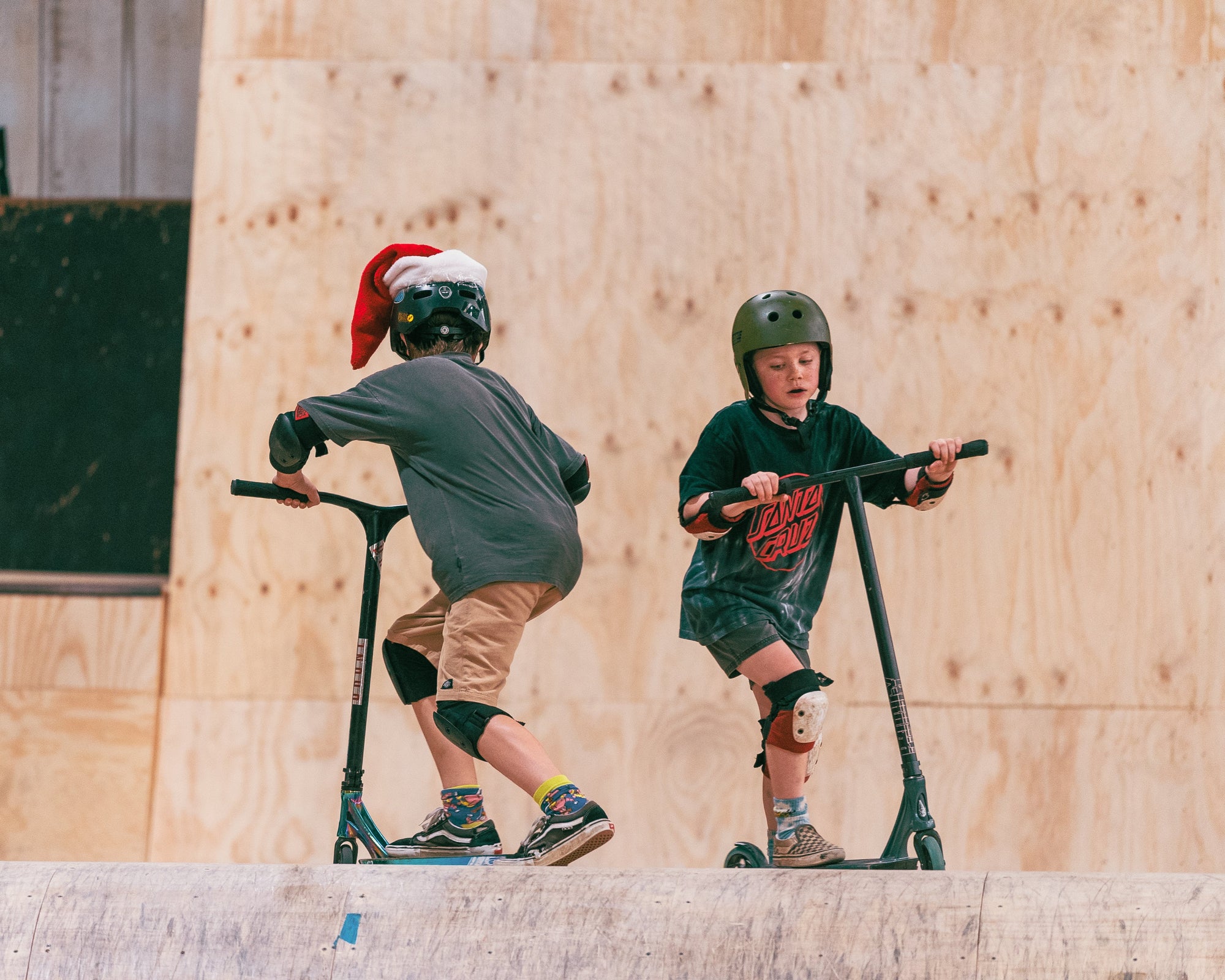 Young Scooter Riders at RampFest working on Basic Freestyle Scooter Skills