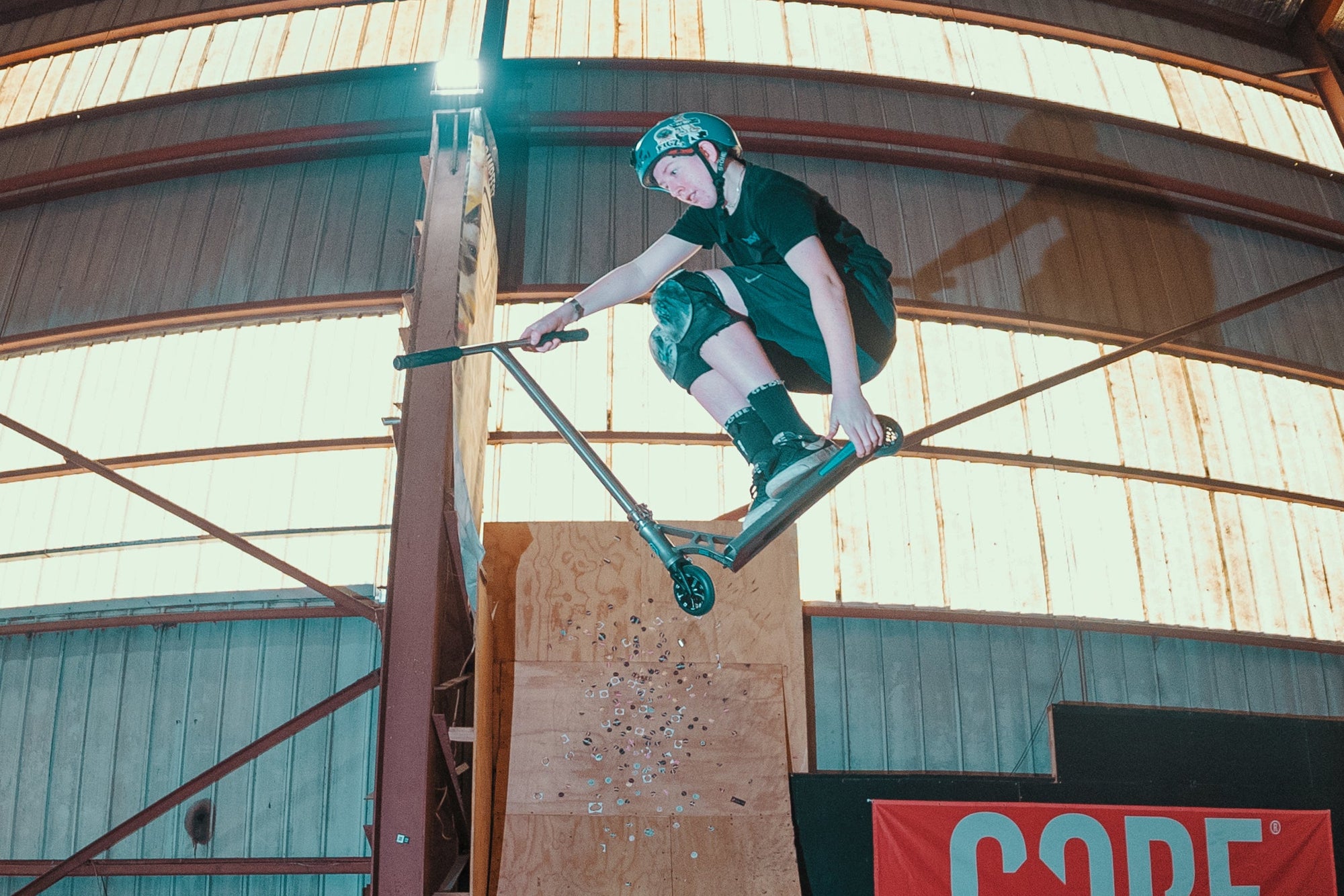 Taj Shambrook riding Freestyle Scooters at Rampfest and doing a T-Bog over the Box Jump.