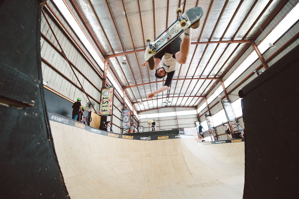 RampFest Skateboard Coach airing over the channel gap during a RampFest Skate Coaching Session.