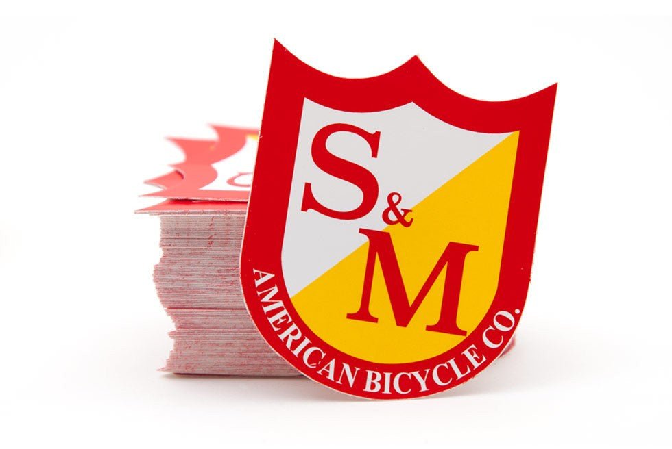 S&M Shield Sticker - Red/Yellow/White Medium | Shop BMX online at RampFest Indoor Skatepark