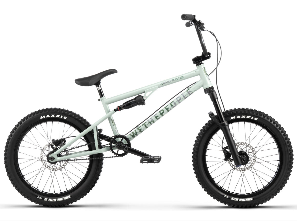 wethepeople full suspension bmx bike in matte swamp grey with black manitou forks and maxxis tyres on white background
